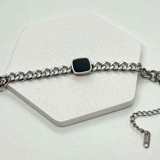 Black charm chain bracelet